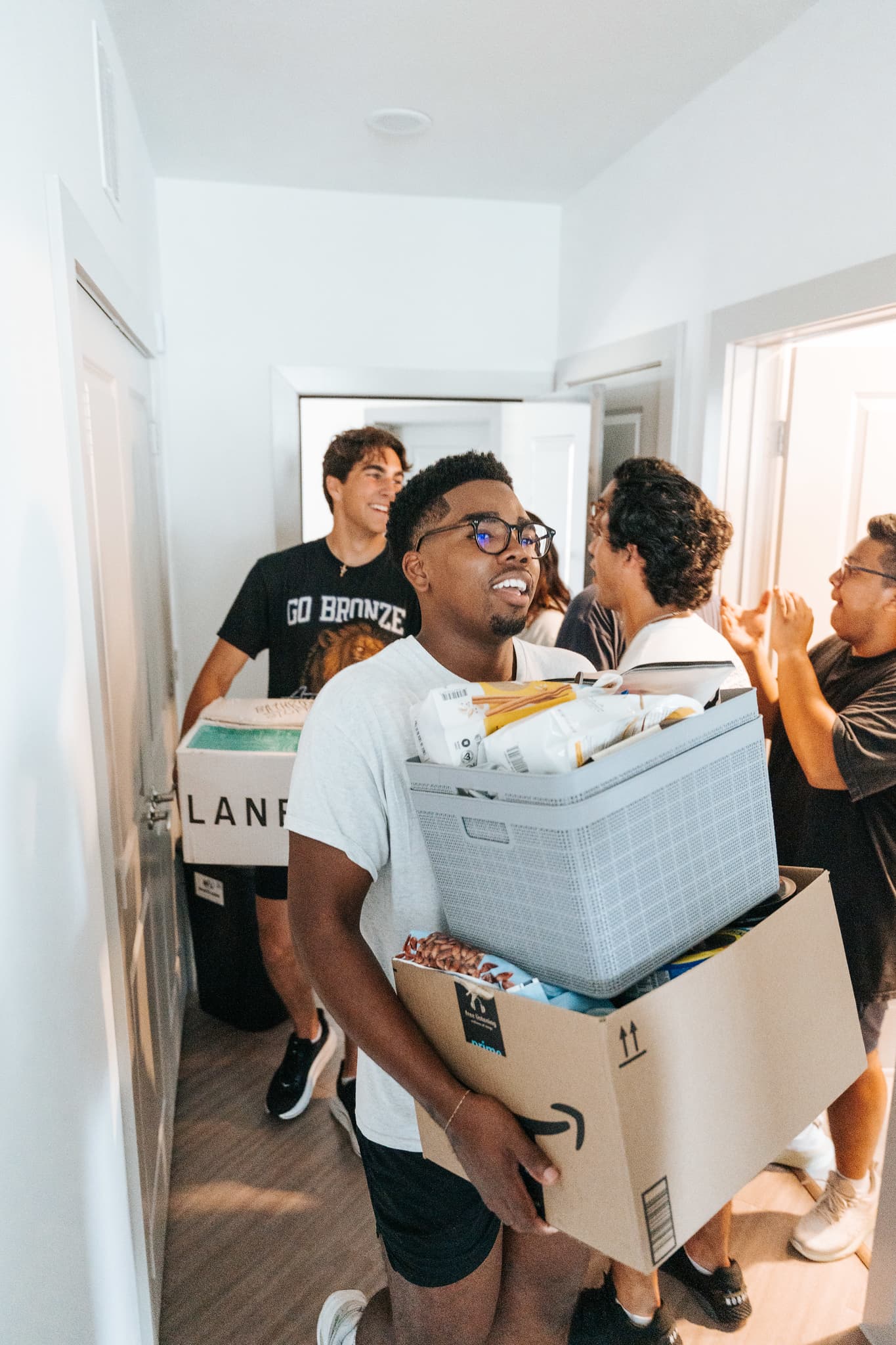 ACU students helping new arrivals
